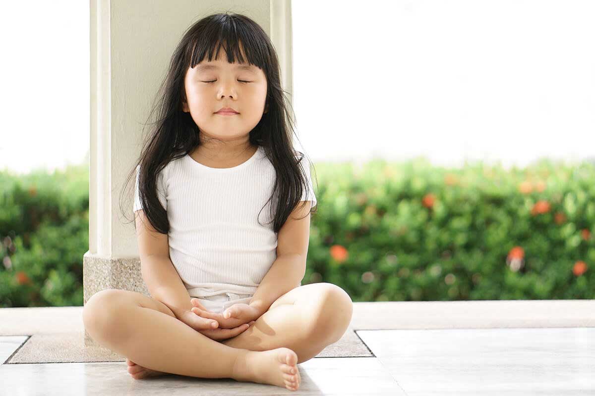 little girl meditating