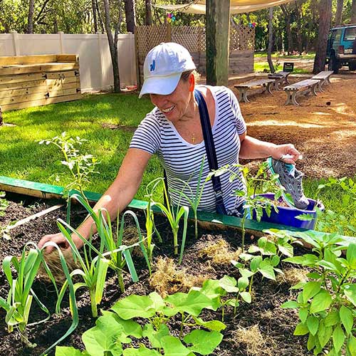 woman looking at her garden